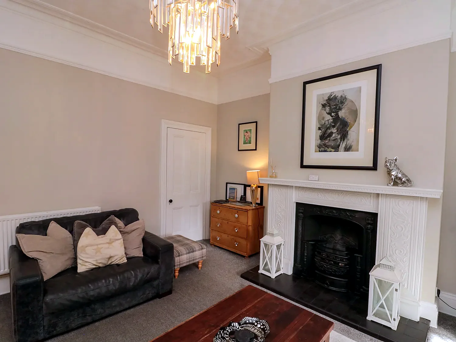 Relaxed lounge with fireplace, soft seating and coffee table