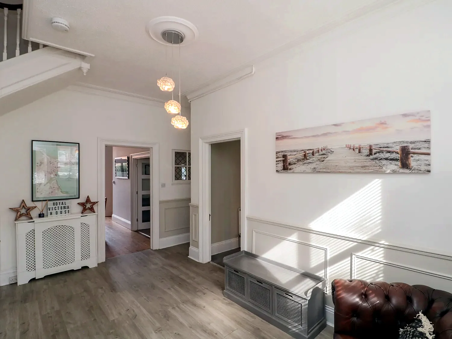 Bright hallway and sitting area with period detailing